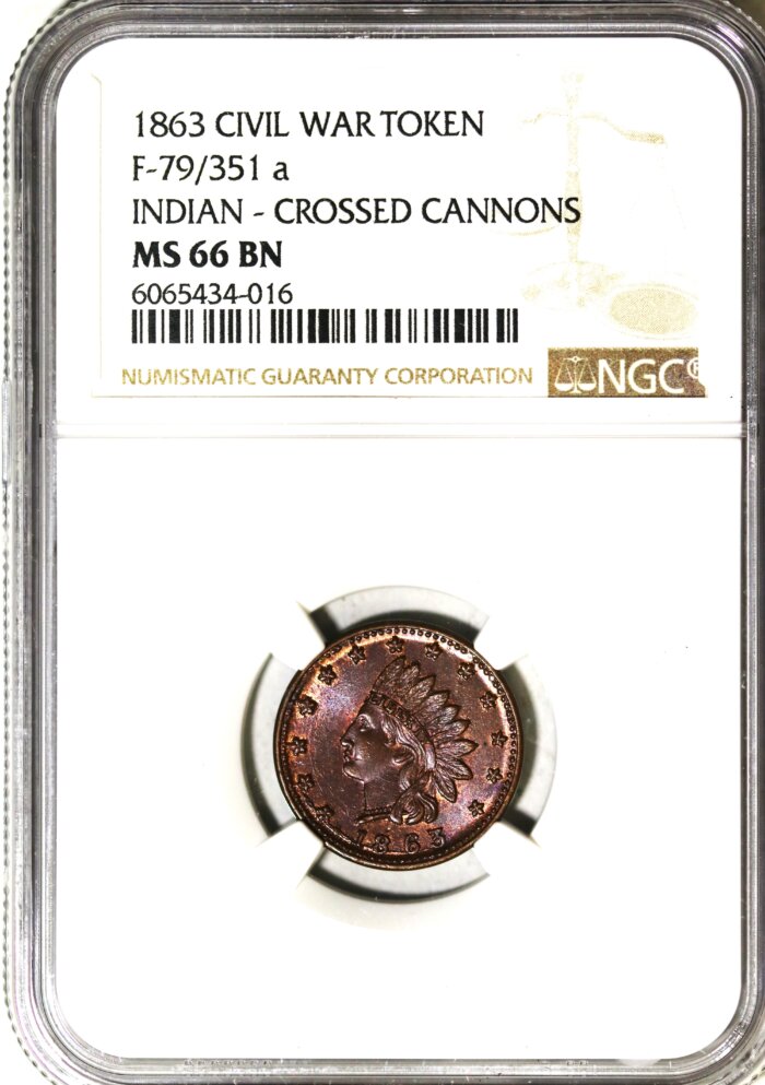 1863 CIVIL WAR TOKEN F-79/351a INDIAN-CROSSED CANNONS NGC MS66 BROWN